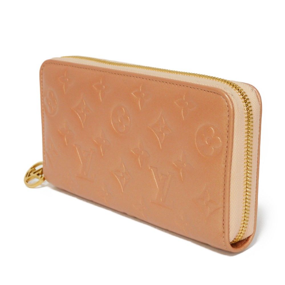 ルイヴィトン モノグラム エンボス ジッピー 長財布 ラウンド