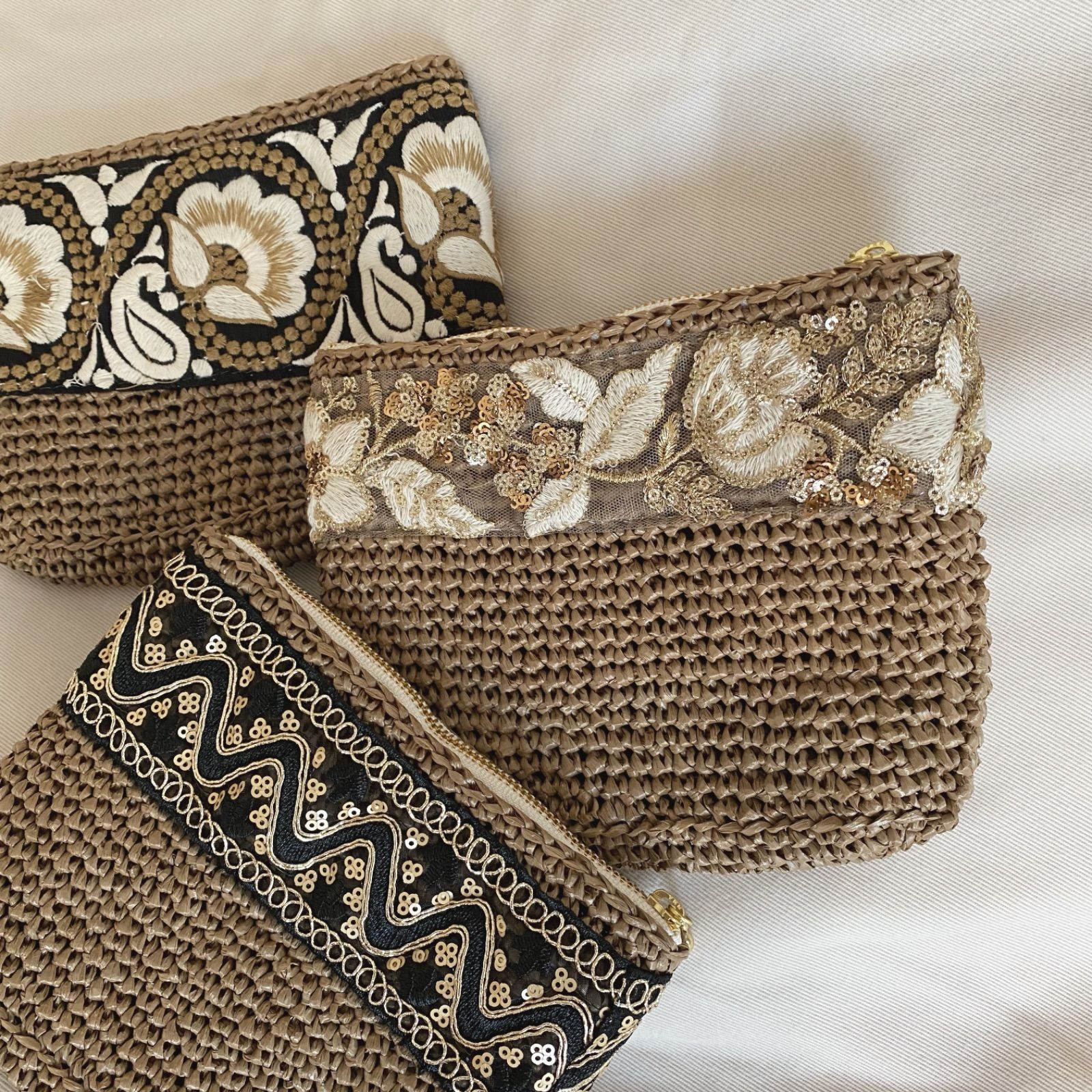 インド刺繍リボン‧✧̣̇‧ラフィアポーチ - メルカリ