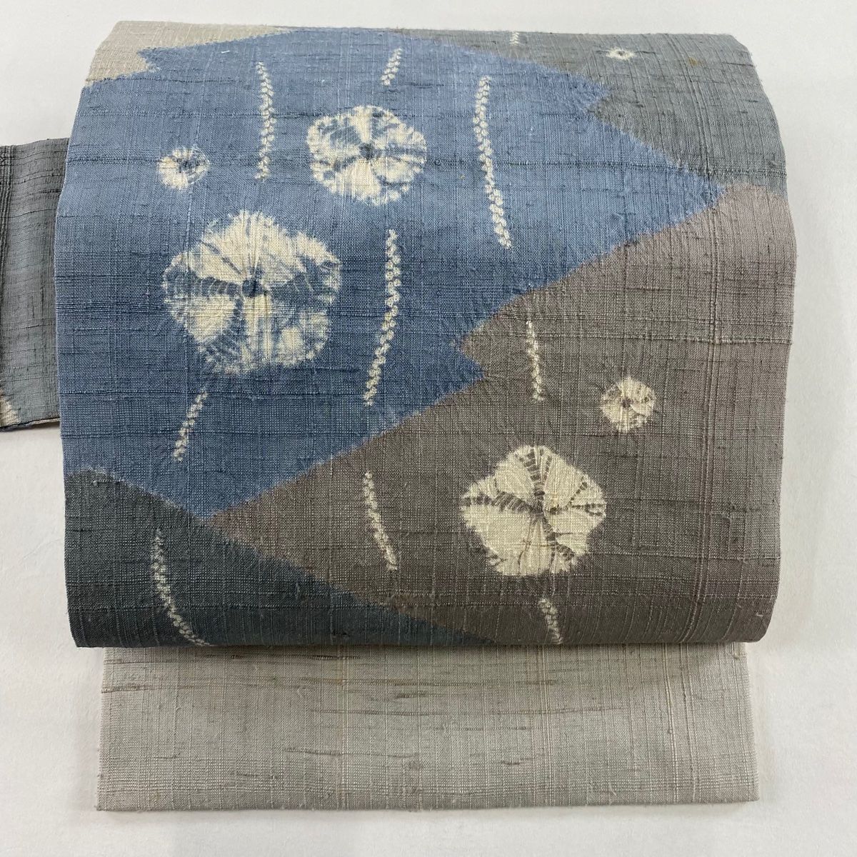 名古屋帯 秀品 紬地 松皮菱 花 絞り 灰緑 正絹