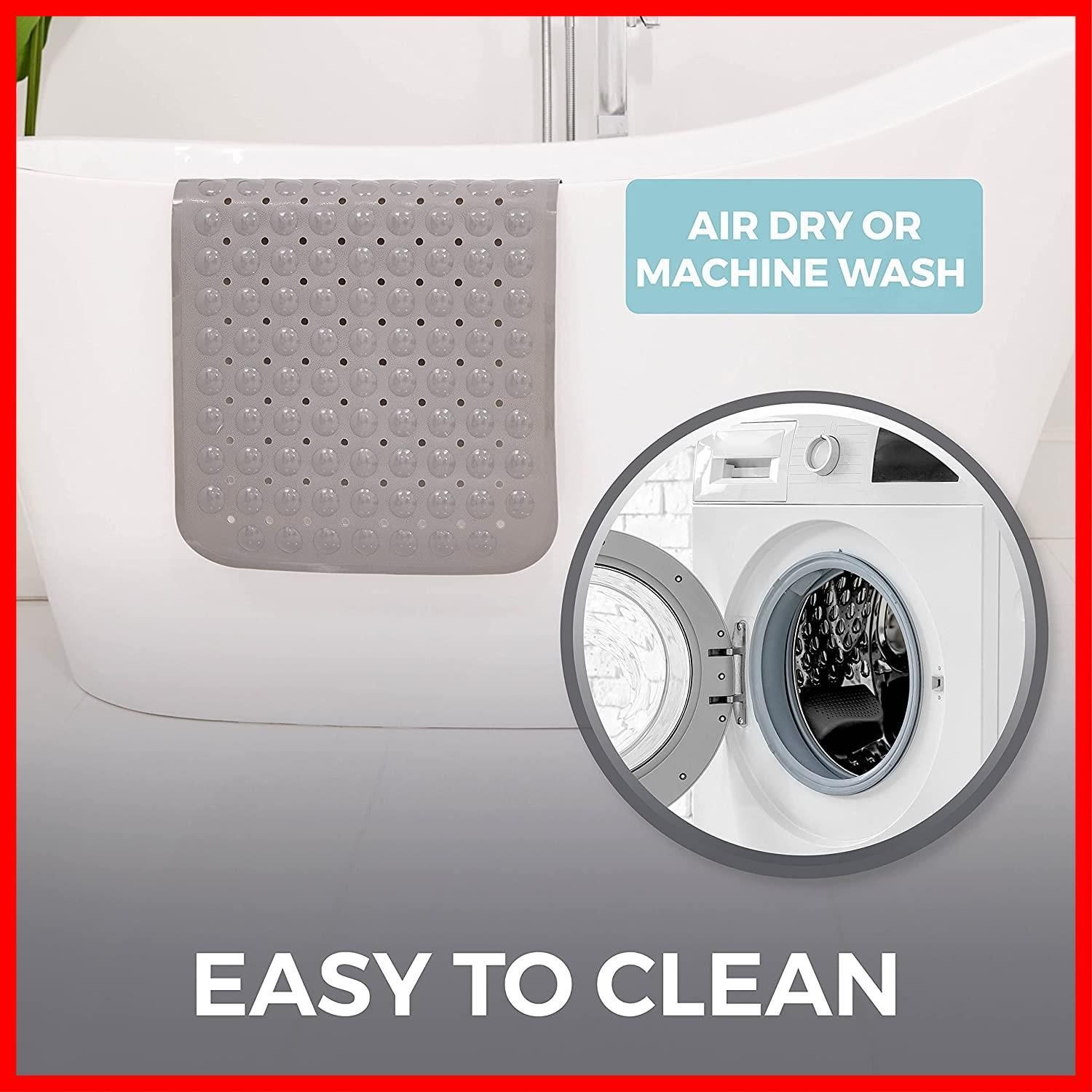 吸引のコップが付いている浴槽のマット