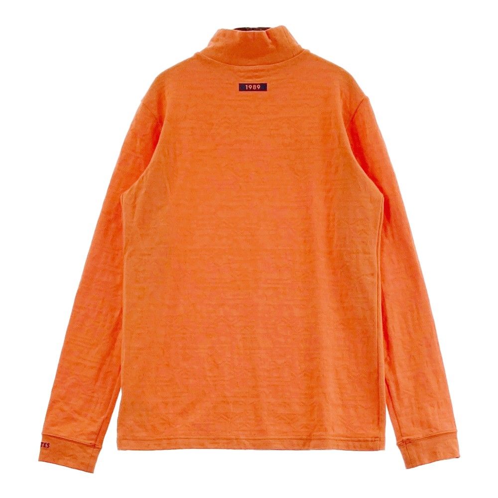 サイズ：2 PEARLY GATES パーリーゲイツ 2023年モデル ハイネック 長袖Tシャツ 総柄 オレンジ系 [240101369470] ゴルフウェア レディース ストスト サイズ：2 PEARLY GATES パーリーゲイツ 2023年モデル