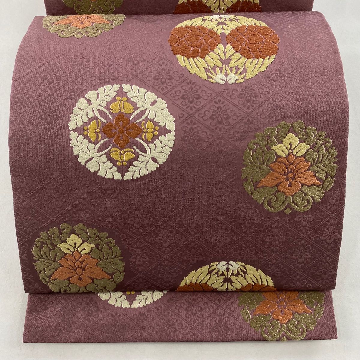 開き名古屋帯 秀品 華文 草花 唐織 赤紫 正絹