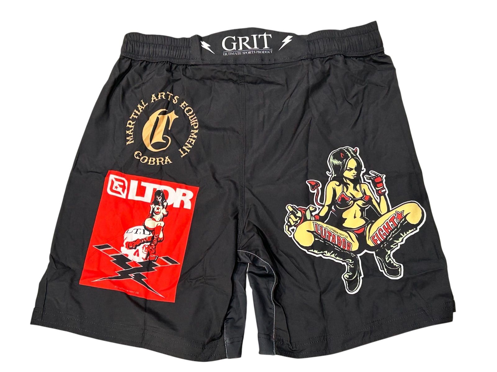 GRIT×LUTADOR LOGO HISTORY FIGHT SHORTS