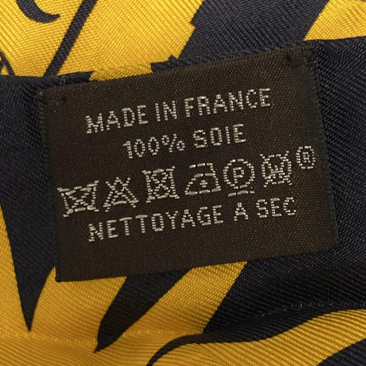 HERMES(エルメス) スカーフ美品 ツイリー グレー×黒×オレンジ リボン  