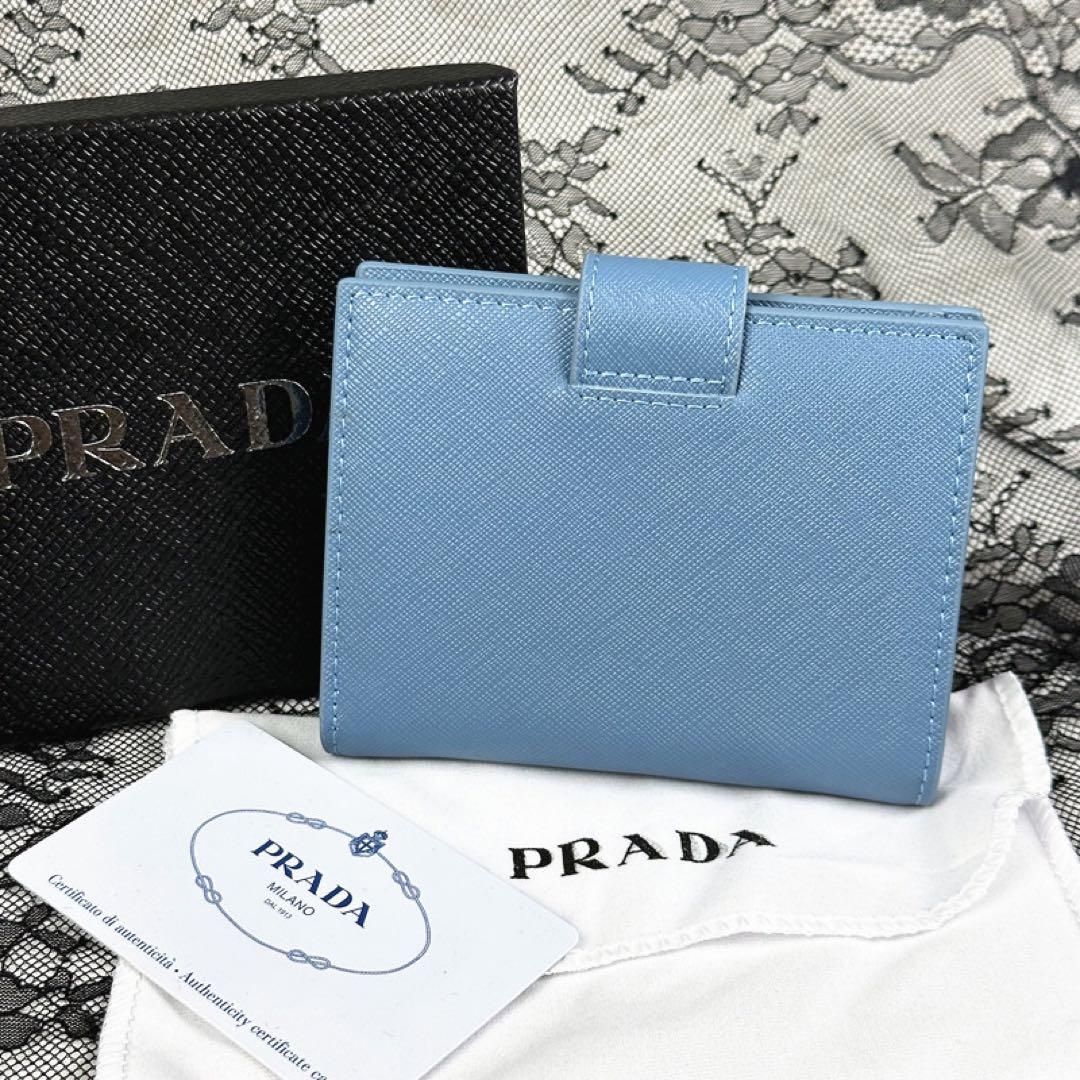 PRADA プラダ サフィアーノタブ 折り財布 ライトブルー - メルカリ