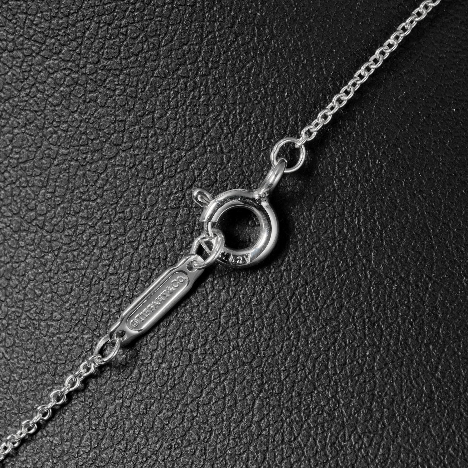 ティファニー3連インターロッキングネックレスシルバー＆ルベドメタル