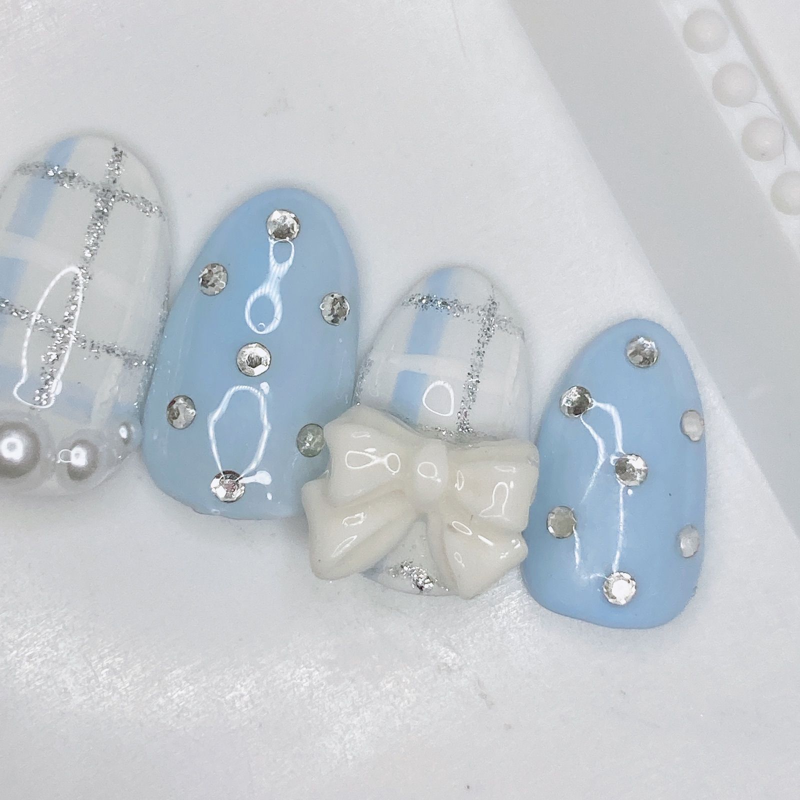 order】ネイルチップ 水色 推し チェック - メルカリ