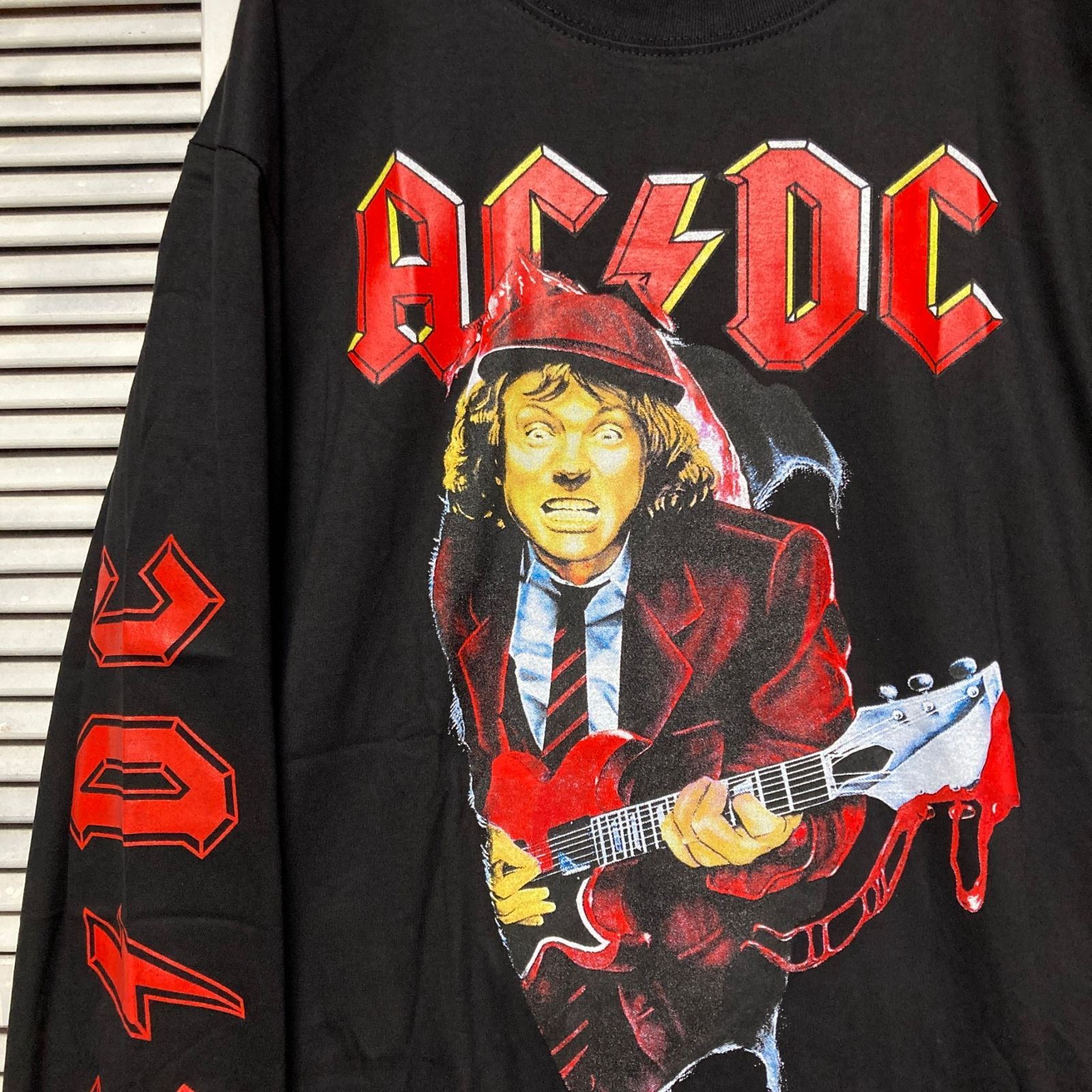 エーシーディーシー ACDC 黒 長袖 Tシャツ ロンT バンド ロングスリーブ デザイン 袖 両面 プリント 派手 奇抜 古着 ビンテージ vintage ロック パンク メタル ヒップホップ ラッパー アーティスト 7部袖 カットソー 