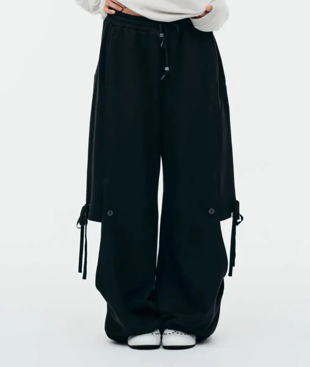 トゥオミオ ズボン DOUBLE LAYERED SWEATPANTS