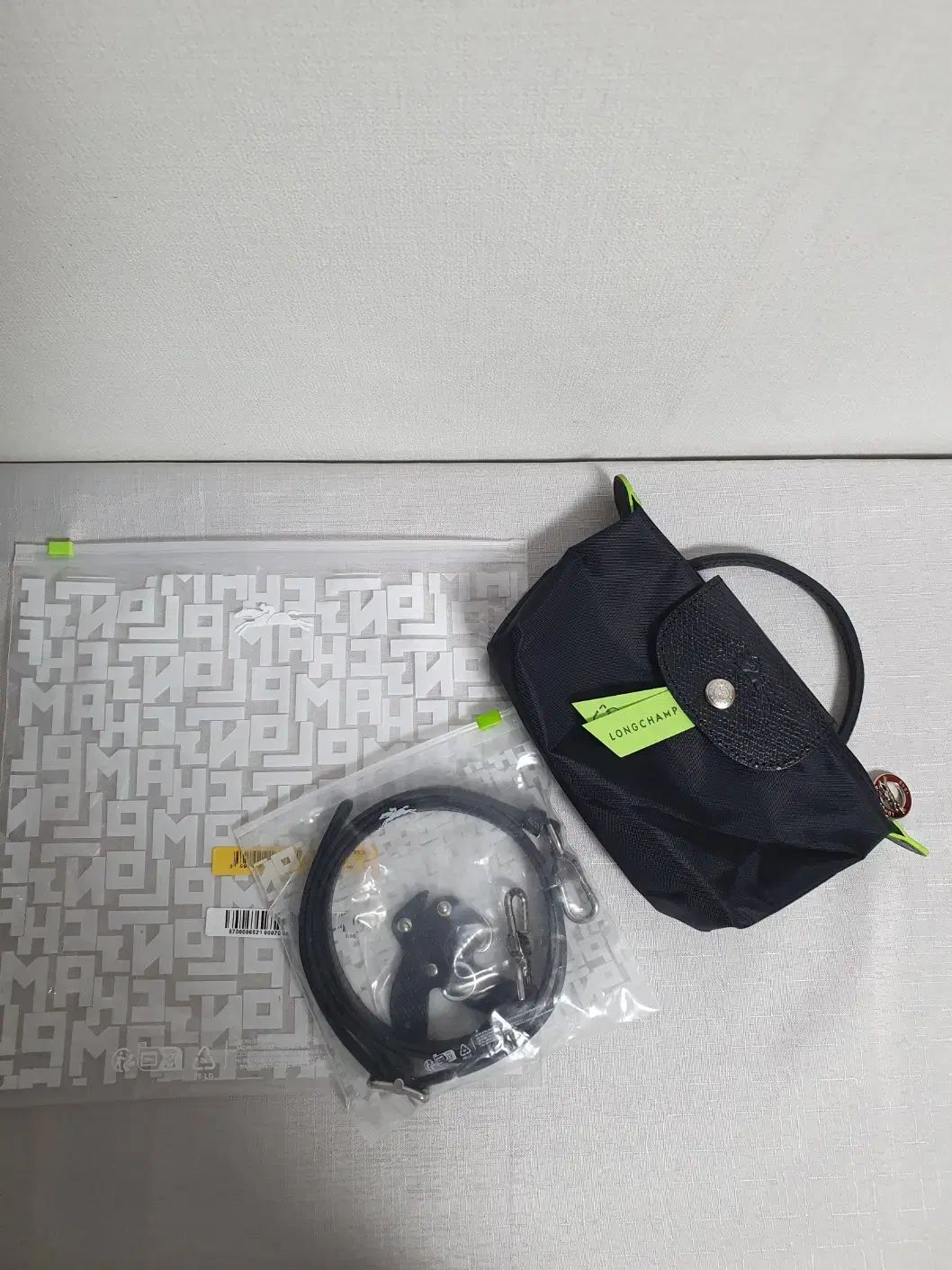| Longchamp ロンシャン または グリーン ポーチ トートバッグ ブラック クロスバッグ