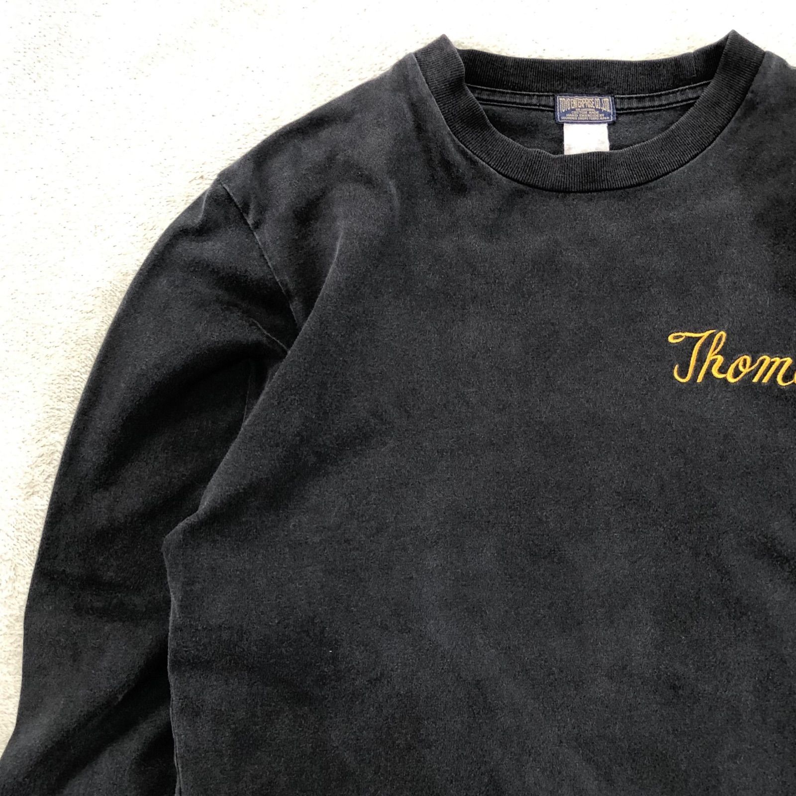 東洋エンタープライズ ロングスリーブTシャツ スカT スーベニア刺繍 ネーム刺繍 Thomas スカル ドクロ Black Guns ロンT 長袖カットソー ブラック 黒