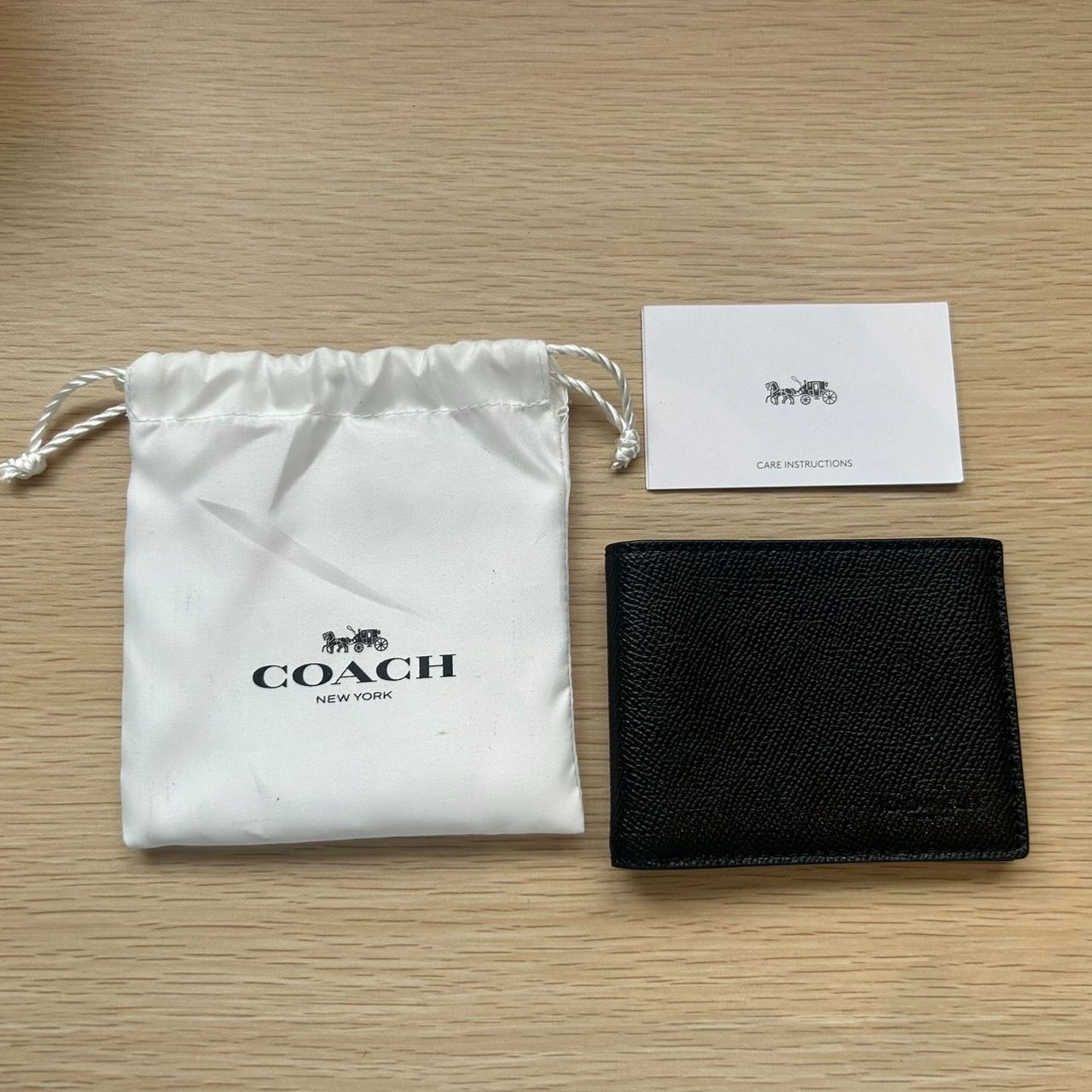 COACH（コーチ）二つ折りカードケース 黒 袋付き - メルカリ
