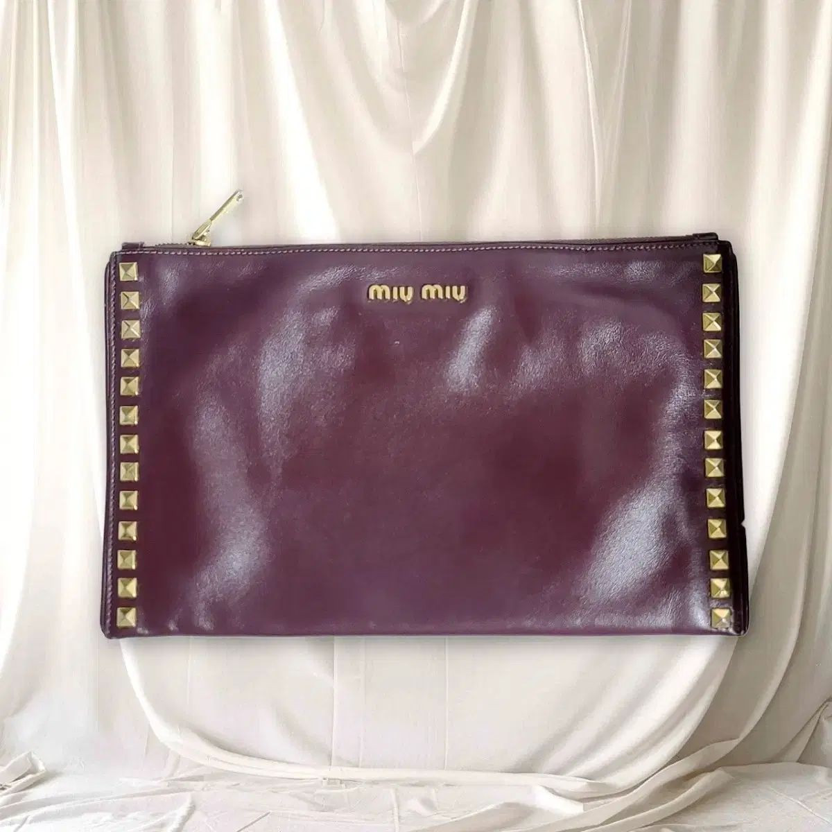 正規品 MIU MIU(ミュウミュウ) クラッチ - メルカリ