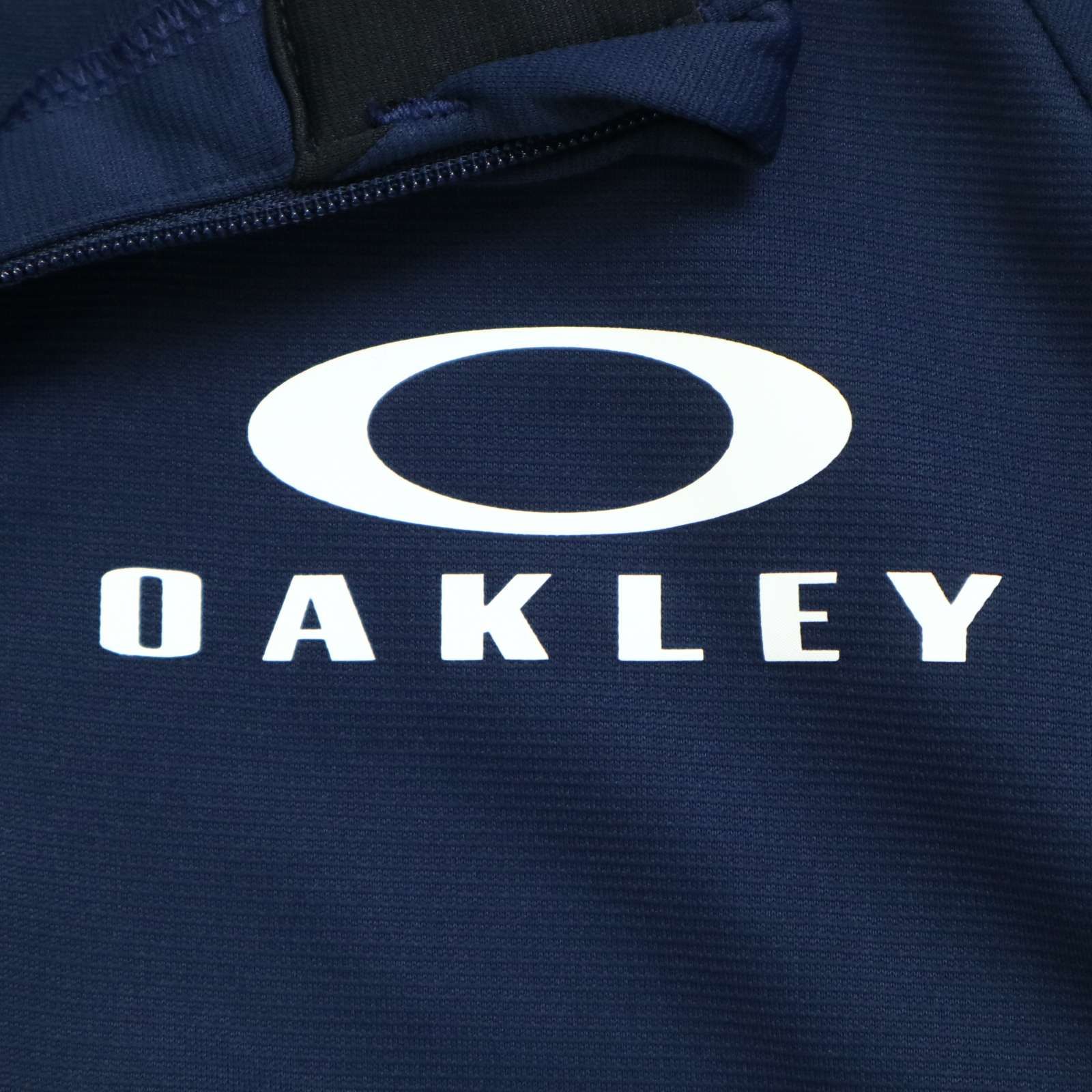 OAKLEY 刺繍　スカル　総柄　半袖　ハーフジップ　ポロシャツ OAKLEY オークリー 通年 スカルコレクション☆ ロゴ刺繍 長袖