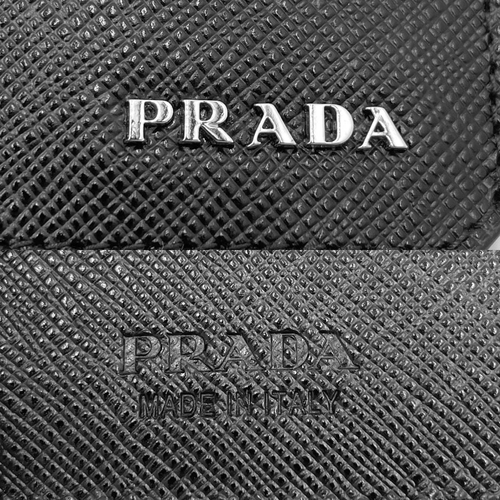 未使用 PRADA 二つ折り長財布 サフィアーノレザー ロゴ金具 2MV001