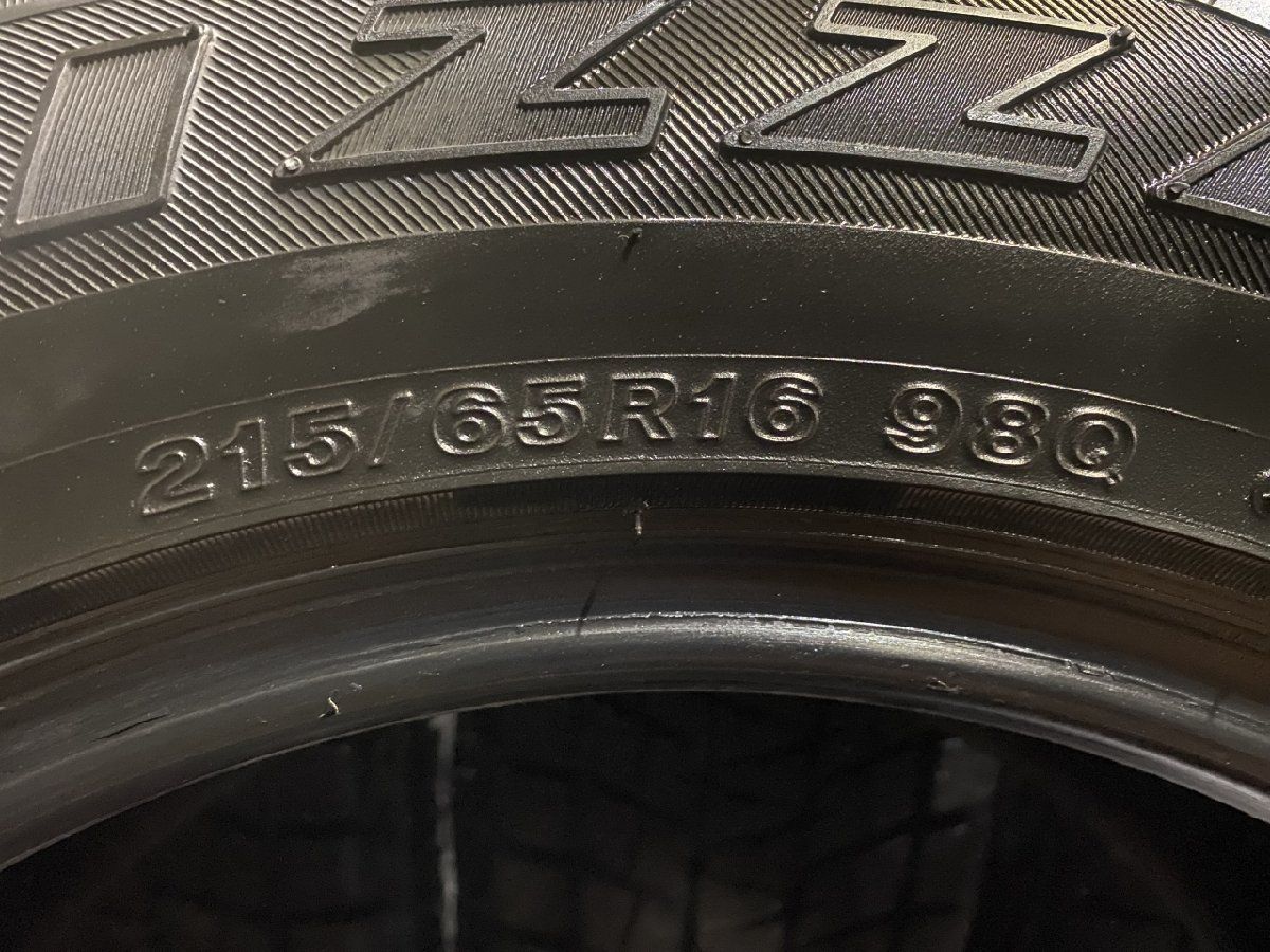 BS BRIDGESTONE BLIZZAK DM-V1 215/65R16 16インチ スタッドレス 4本 20～21年製 バリ溝 ハイエース  エクストレイル等　(KTN011)