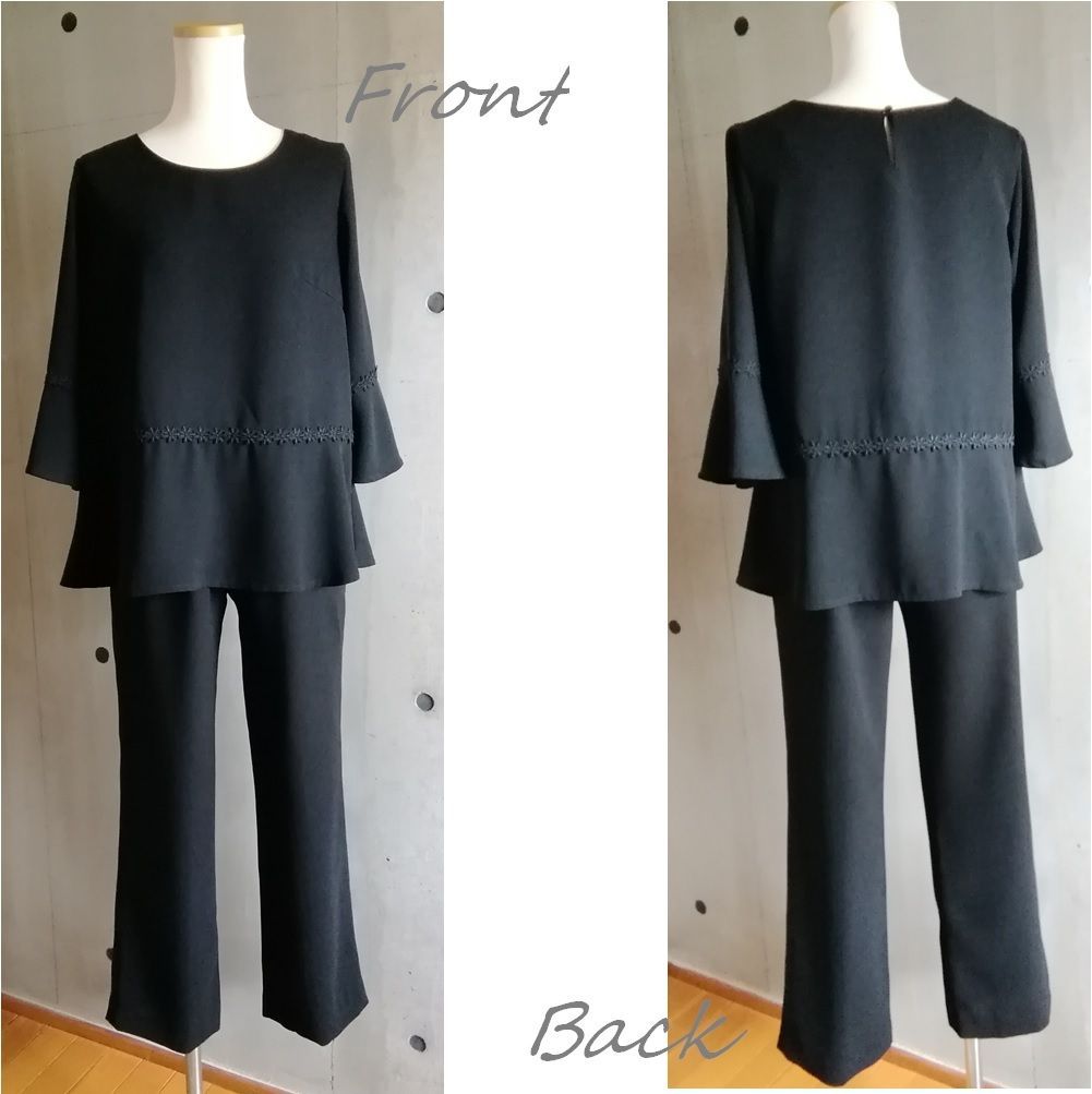 ゆったりチュニックブラウスとパンツのスーツ