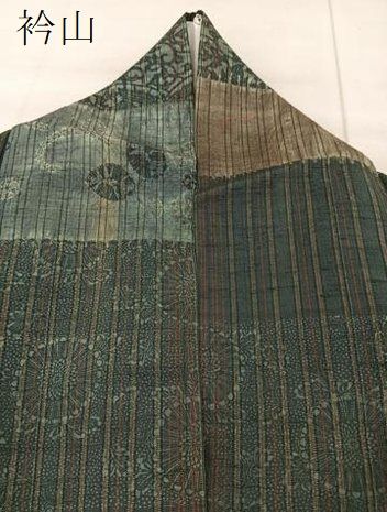 平和屋着物○伝統工芸士 七代目 吉澤与市 紬 絞り 型染め 切嵌更紗花文  