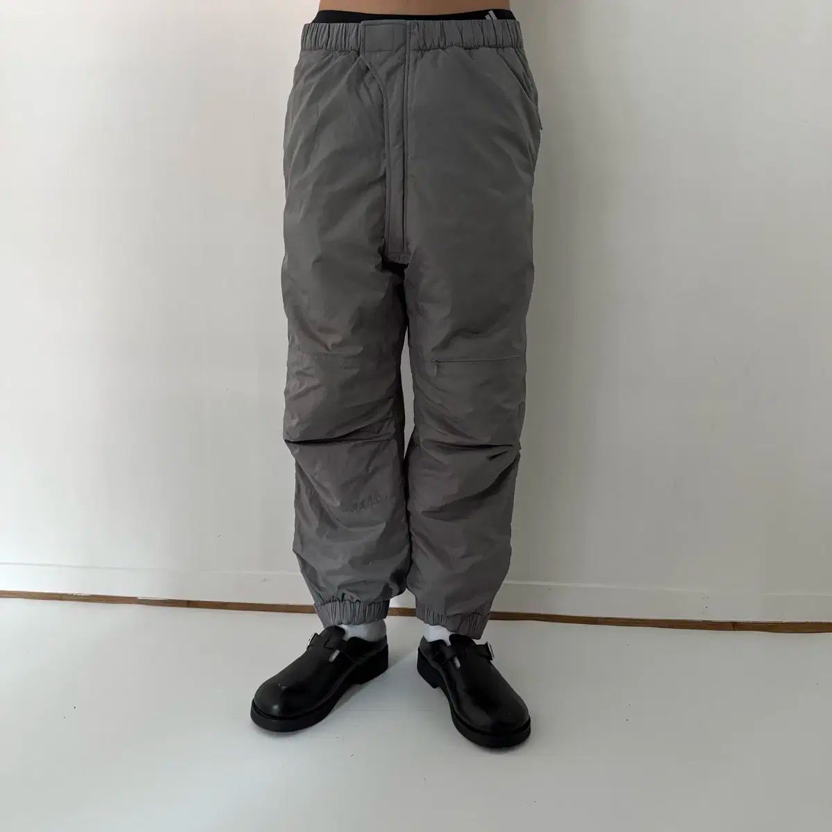 ディスイズネバーザット プリマロフト パンツ