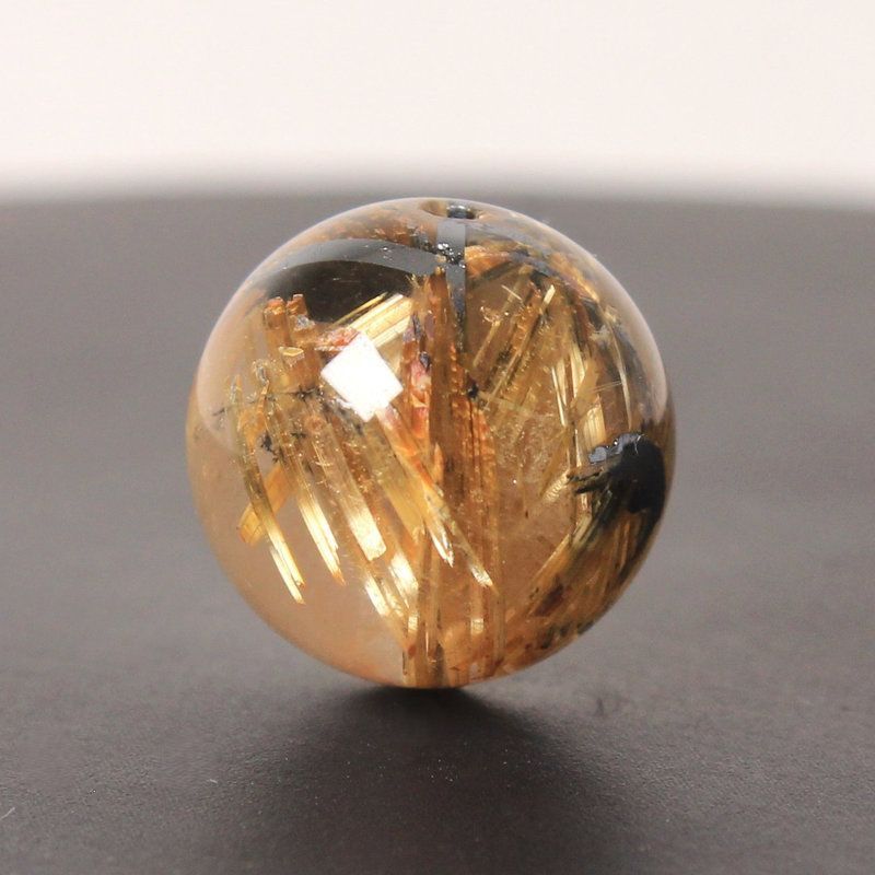 キャッツアイルチル 8ミリ 猫目金針水晶 粒売り 貫通穴あり ギラギラ