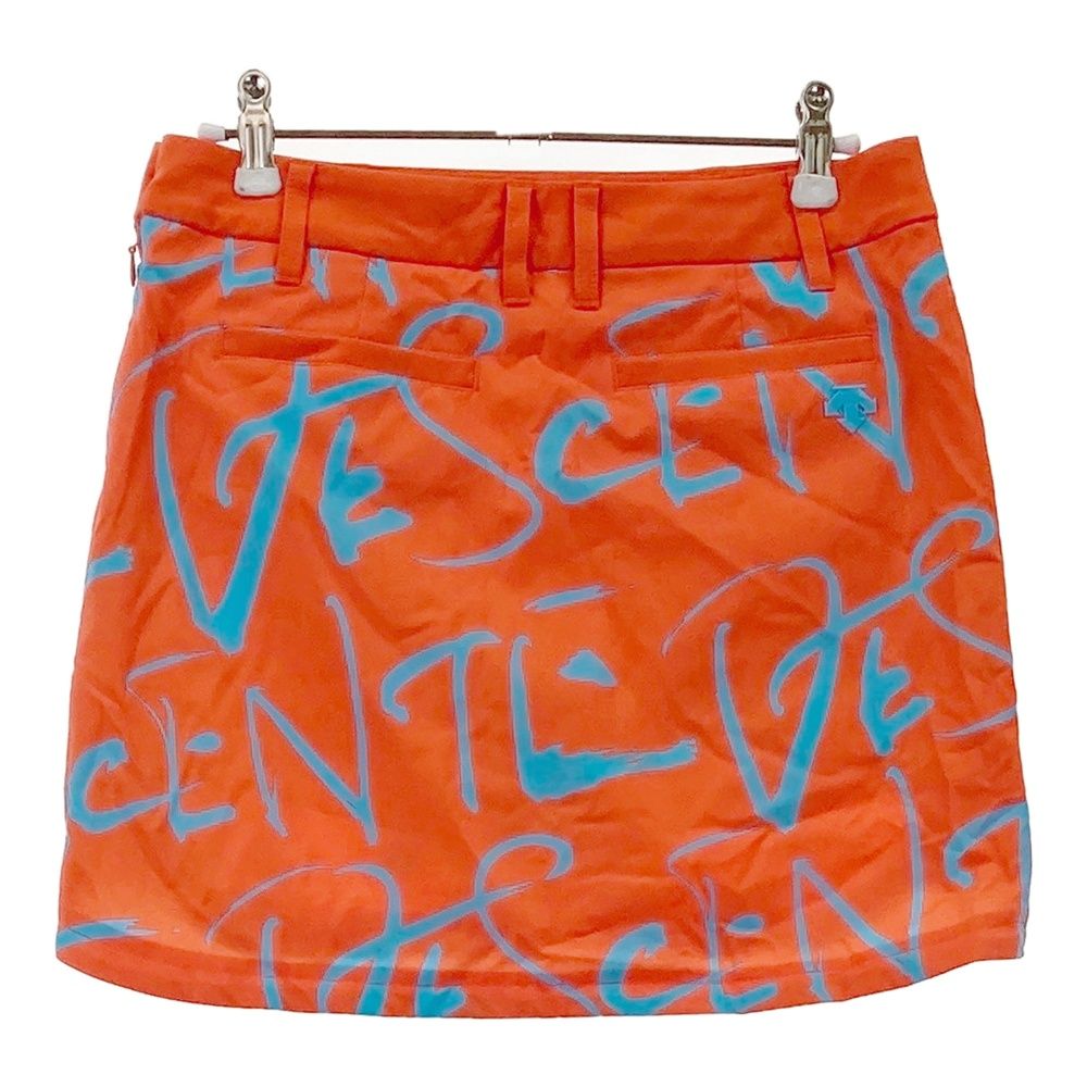 サッパリした サイズ S DESCENTE GOLF デサントゴルフ ×万美 インナー付スカート 総柄 オレンジ系 240101530225 ゴルフウェア レディース ストスト