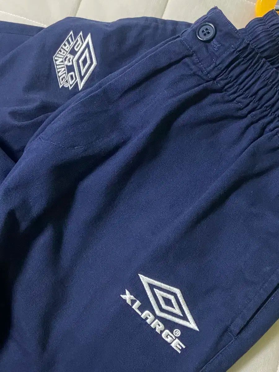 Umbro Xーlarge ドリルパンツ 希少］XLARGE×UMBRO DRILL PANTS - メルカリ