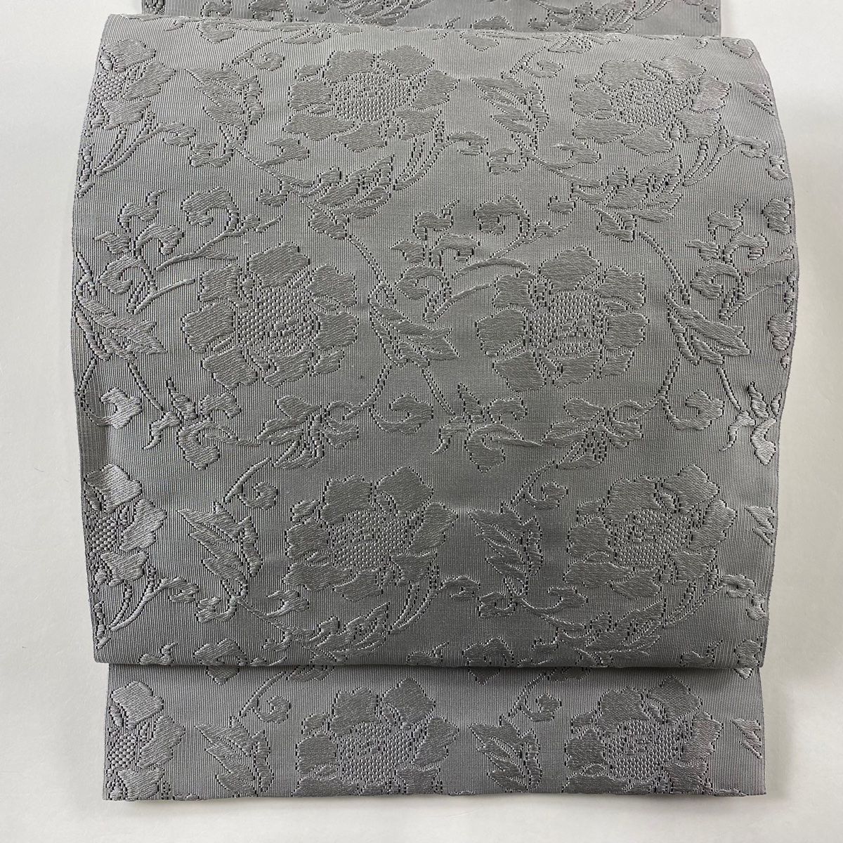 名古屋帯 秀品 八寸名古屋帯 松葉仕立て 花唐草 灰色 正絹