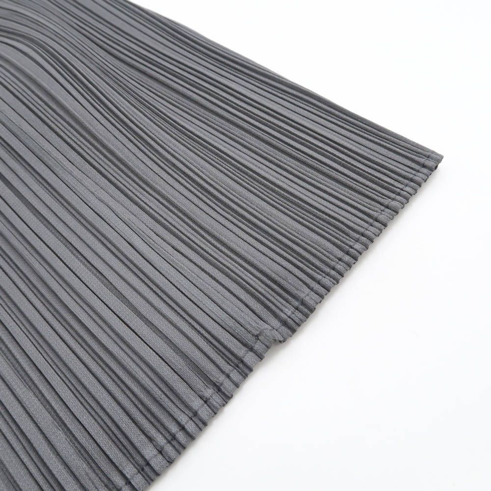 PLEATS PLEASE