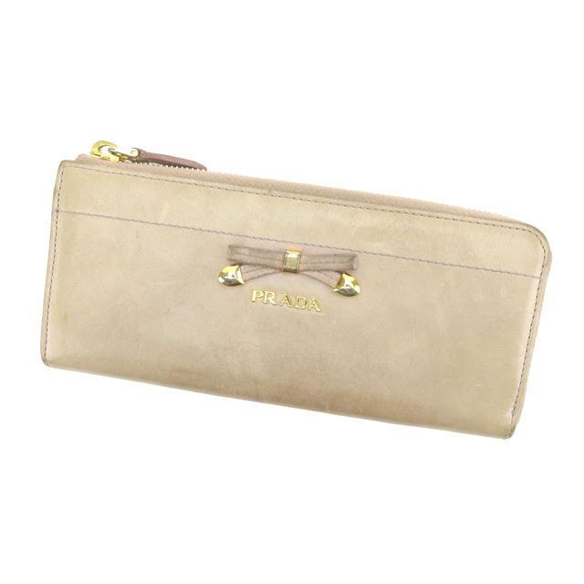 PRADA L字ファスナー リボン付き長財布 ベージュ PRADA リボン付き長財布 ベージュ - メルカリ