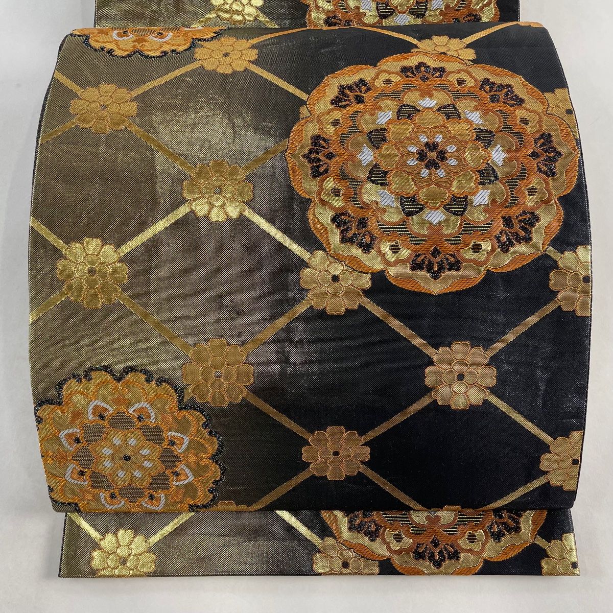 新品！オシャレ！西陣織元 袋帯 黒地 金色葉模様 金銀糸箔使用 