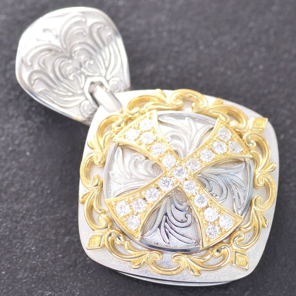 ハートシェープ型ピジョンブラッドルビーメレダイヤのペンダントトップ