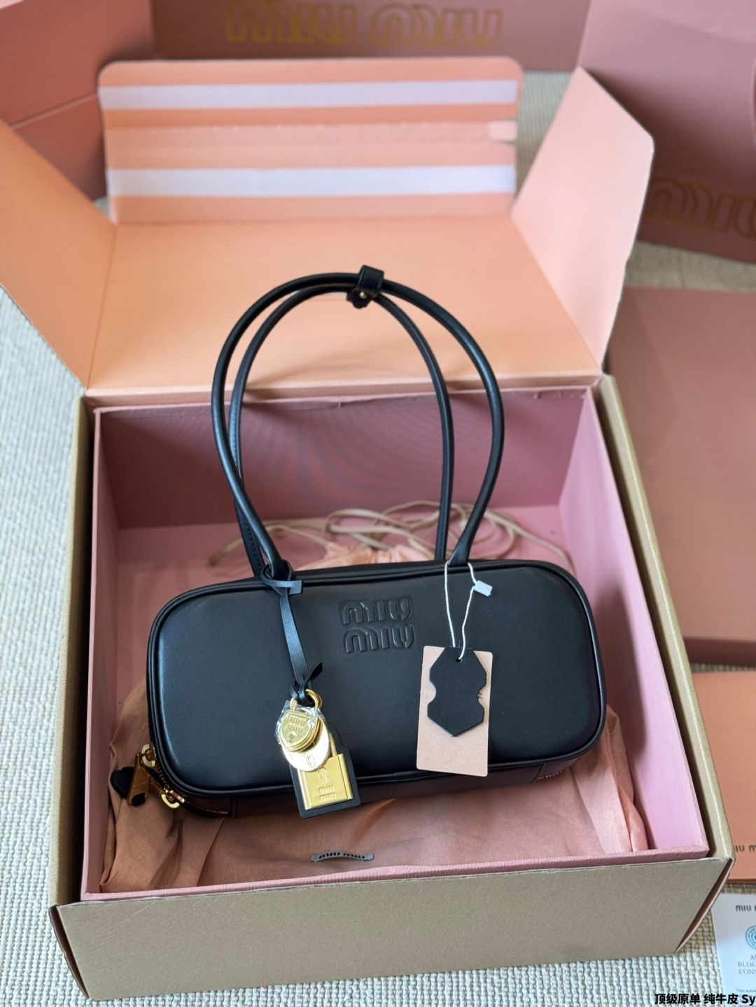 今日特価】Miu Miu Long - handle Bowling Bag ミュウミュウ