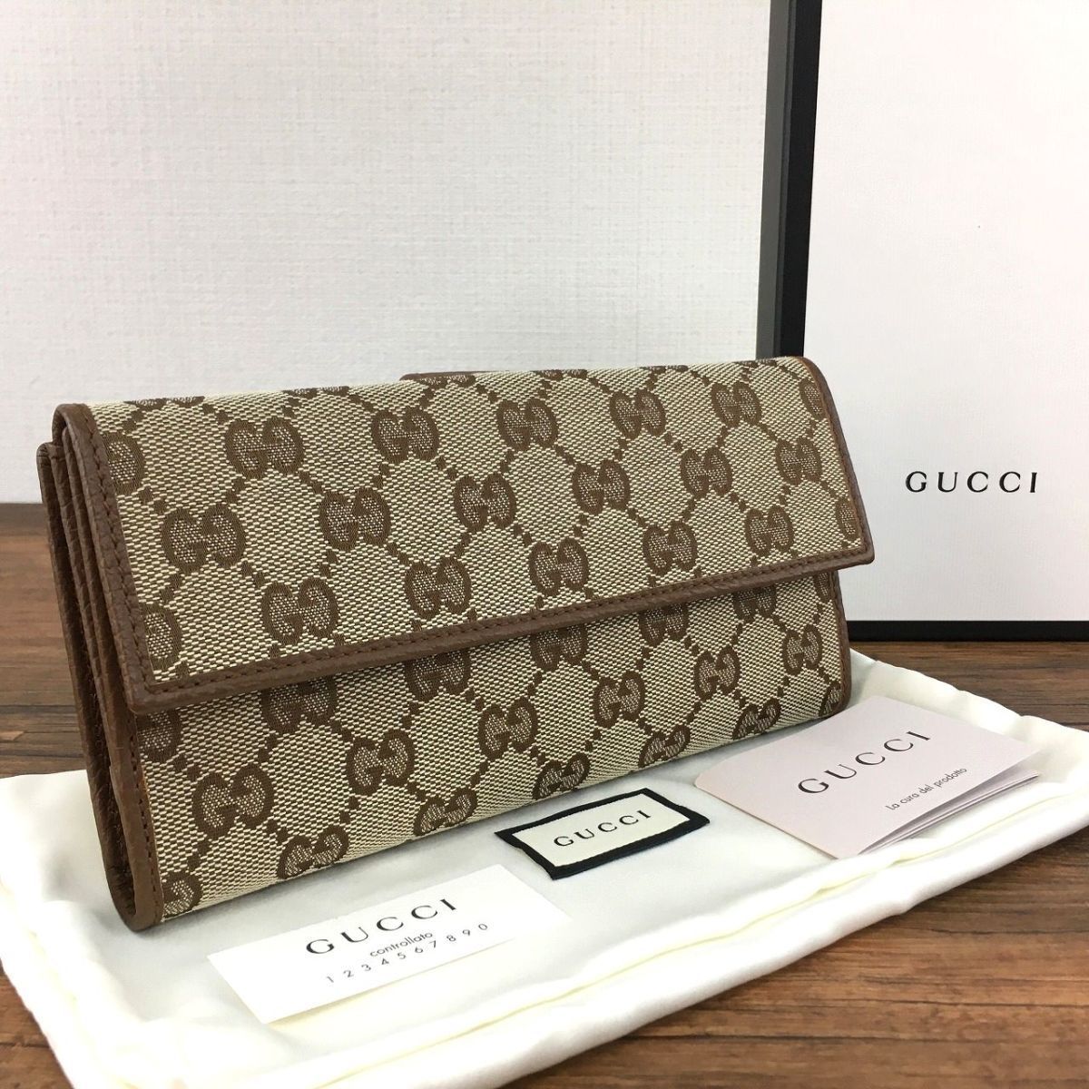 未使用品 GUCCI Wホック財布 143389 こげ茶 108 長財布 小物