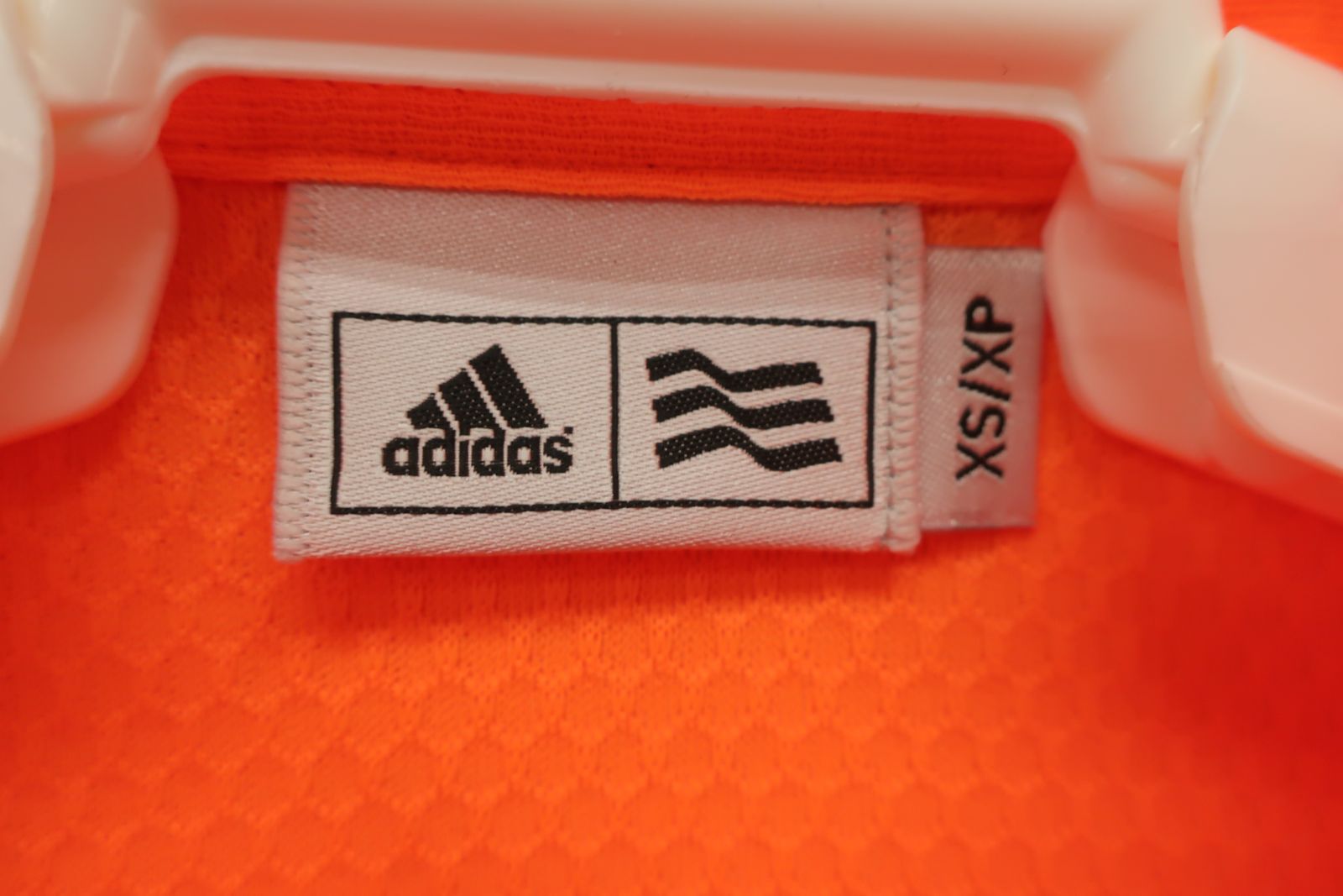 未使用品】adidas(アディダス) ポロシャツ オレンジ レディース XS