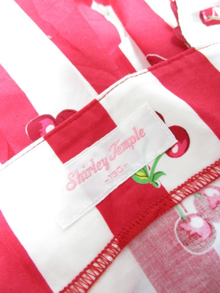 ベリーですシャリーテンプルワンピースタグ付き新品、未使用 新品タグ付き】ShirleyTemple ワンピース 130cm フルーツ柄