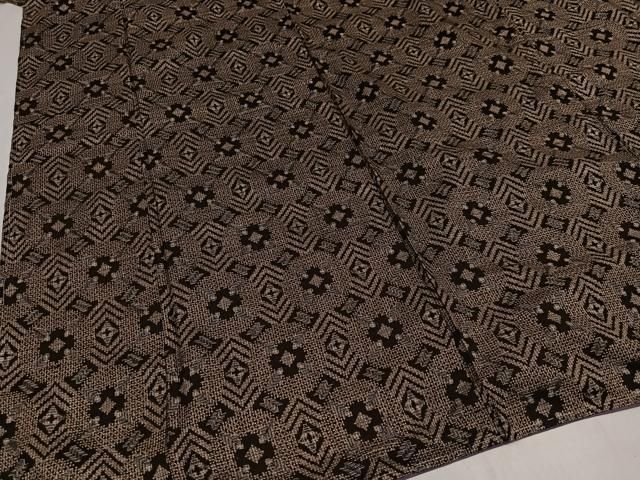 平和屋着物○本場大島紬 割り込み絣 菱丸文 正絹 逸品 未使用