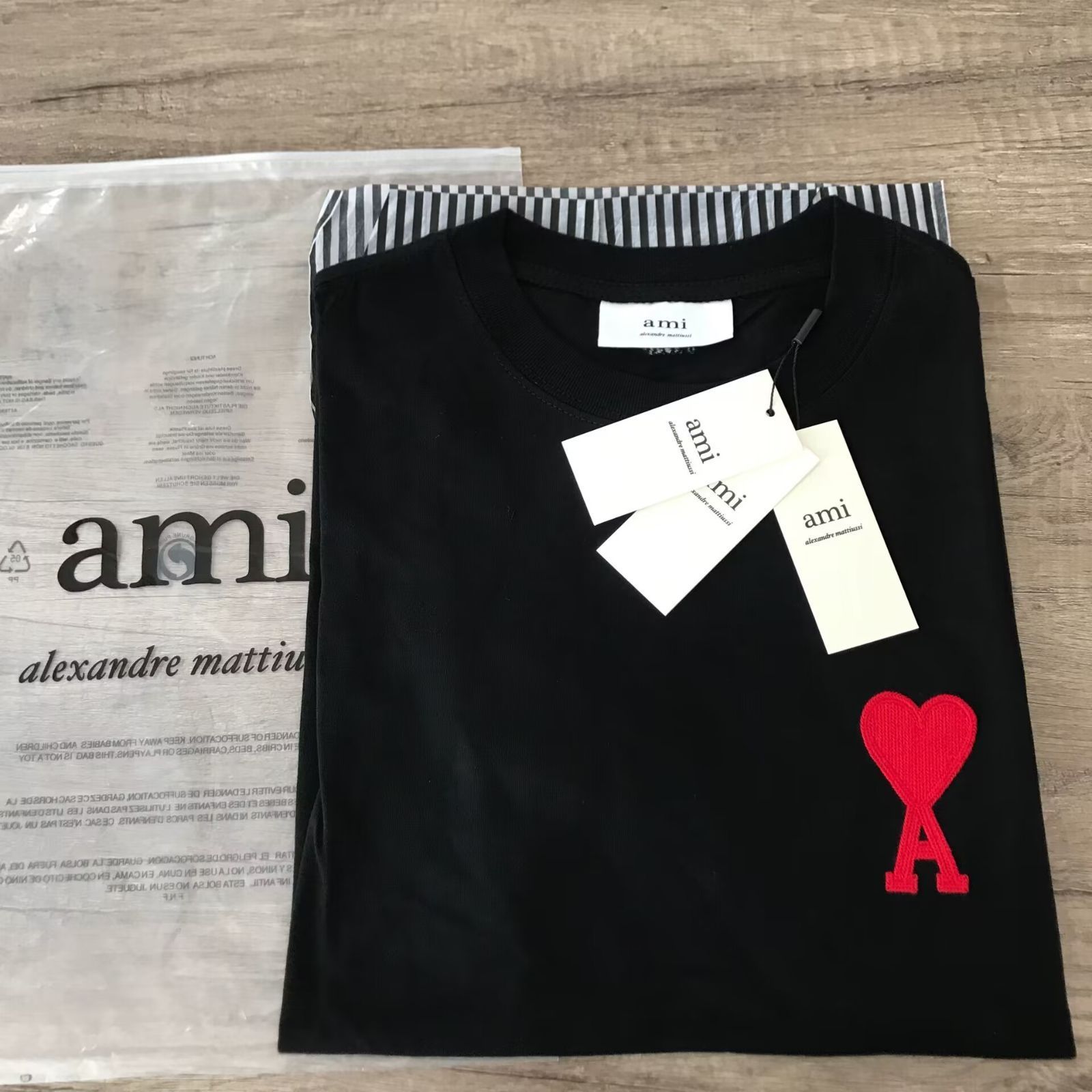 新品、未使用アミパリス AmiParis 半袖 Tシャツ 男女兼用 ブラック - メルカリ