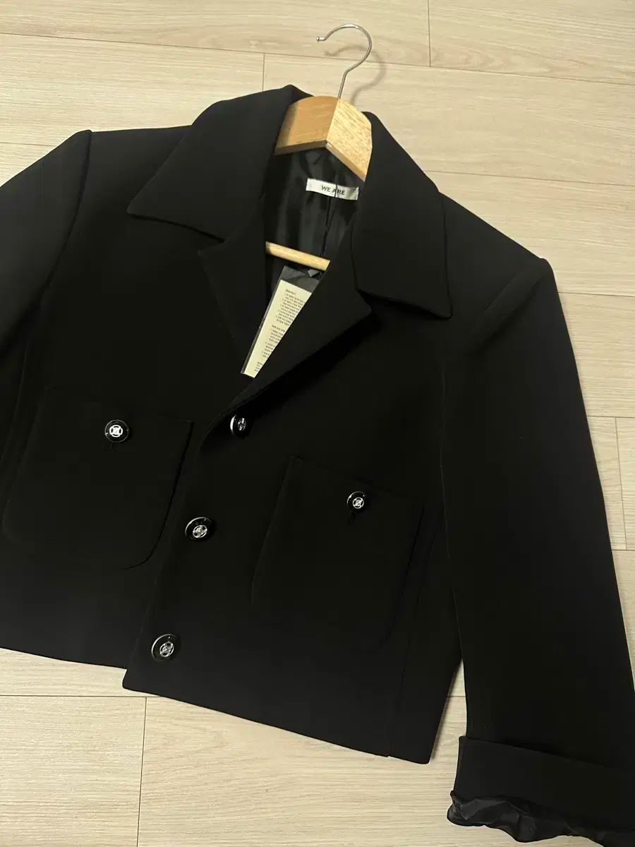タグ ジャケット