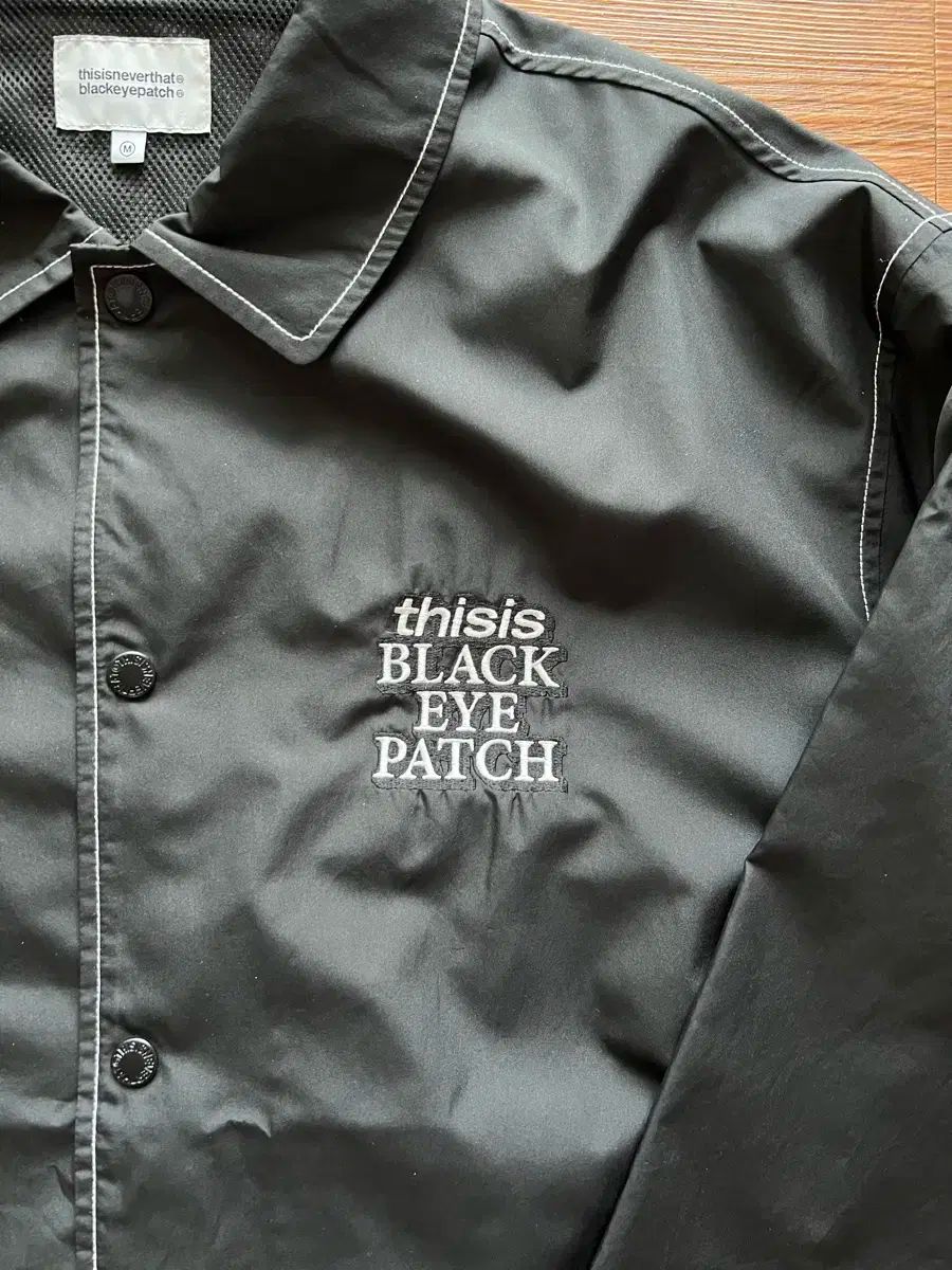 thisisneverthat(ディスイズネバーザット) ブラックアイパッチ コーチ