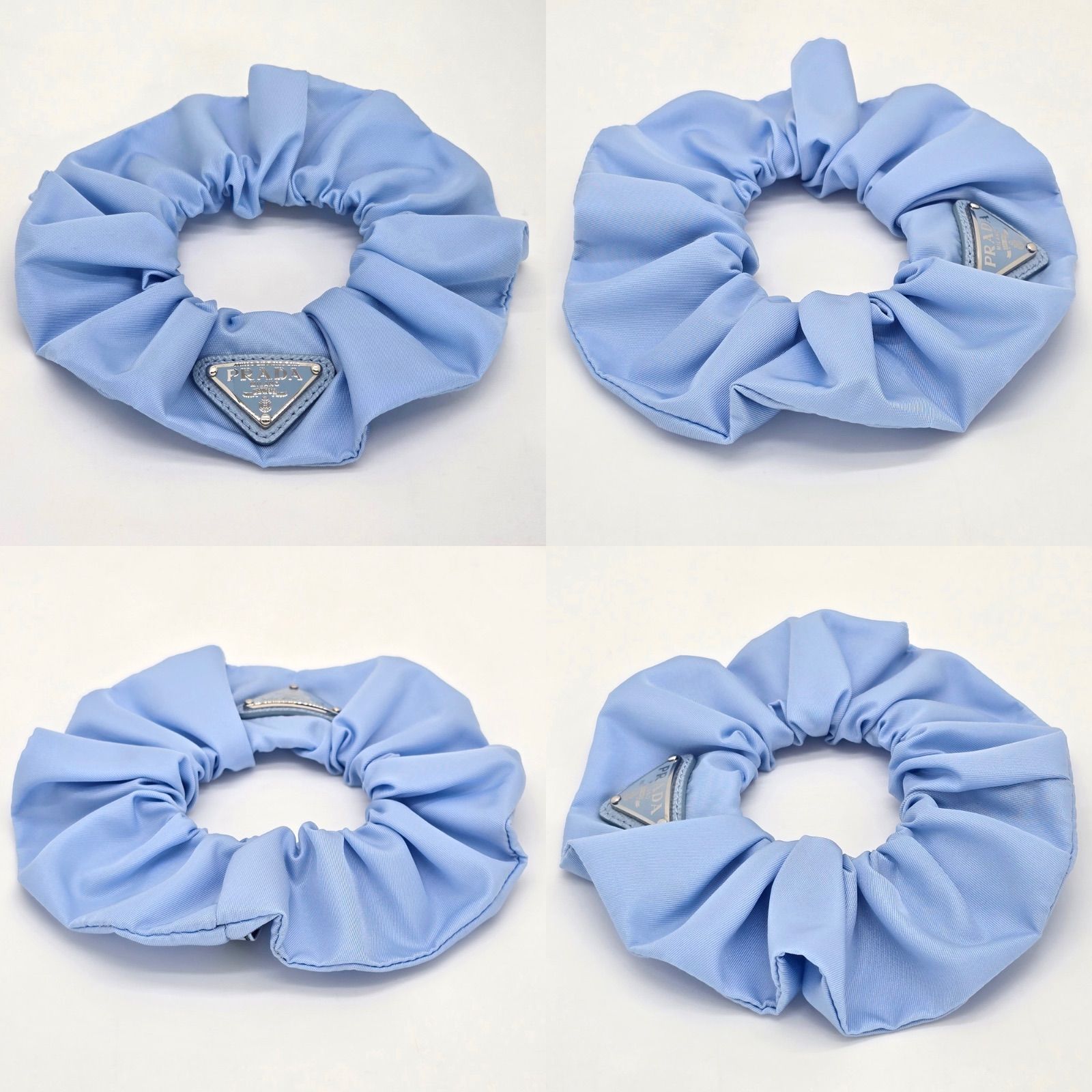 PRADA トライアングル ヘアクリップ ブルー 人気 商品 通販