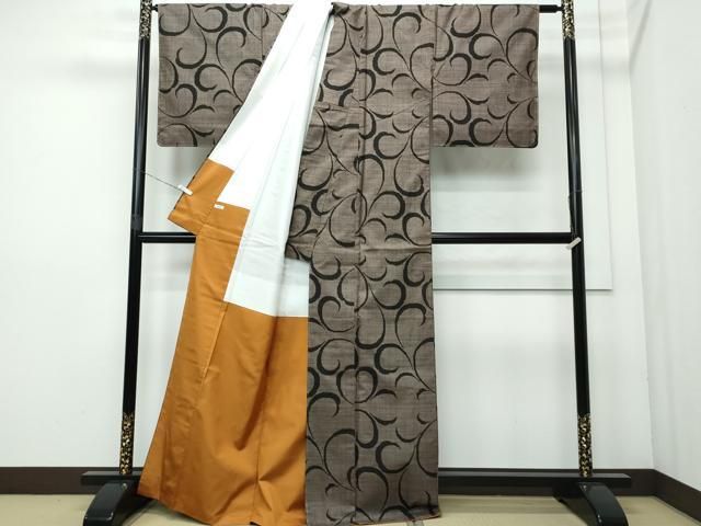 平和屋着物○本場大島紬 7マルキ 泥染め 唐草文 正絹 逸品 未使用  