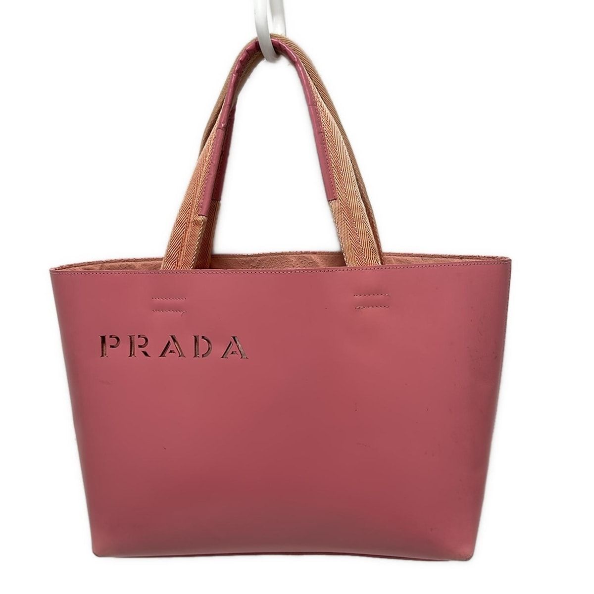 PRADA(プラダ) トートバッグ - ピンク パンチングロゴ レザー
