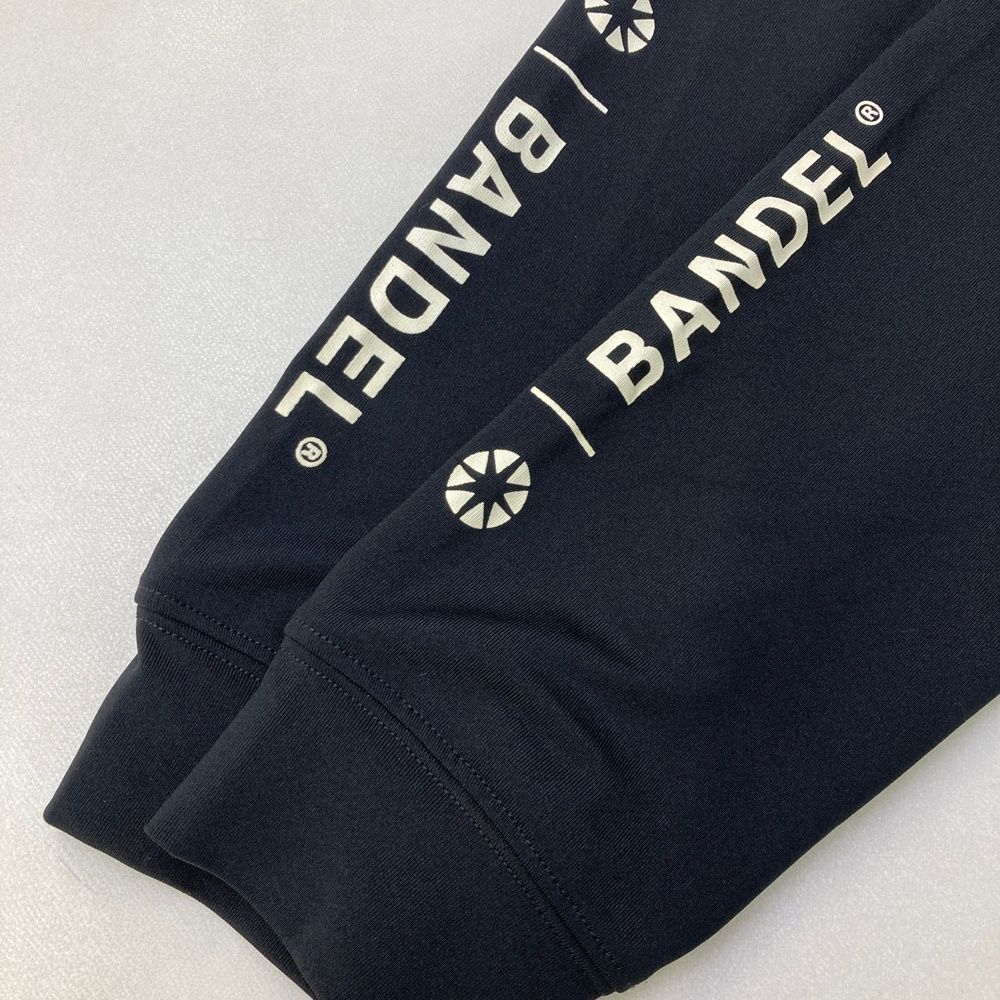 サイズ：5 MUTA MARINE ムータマリン ×BANDEL ジップパーカー  ブラック系 [240101483652] ゴルフウェア メンズ ストスト サイズ：5 MUTA MARINE ムータマリン ×BANDEL ジップパーカー