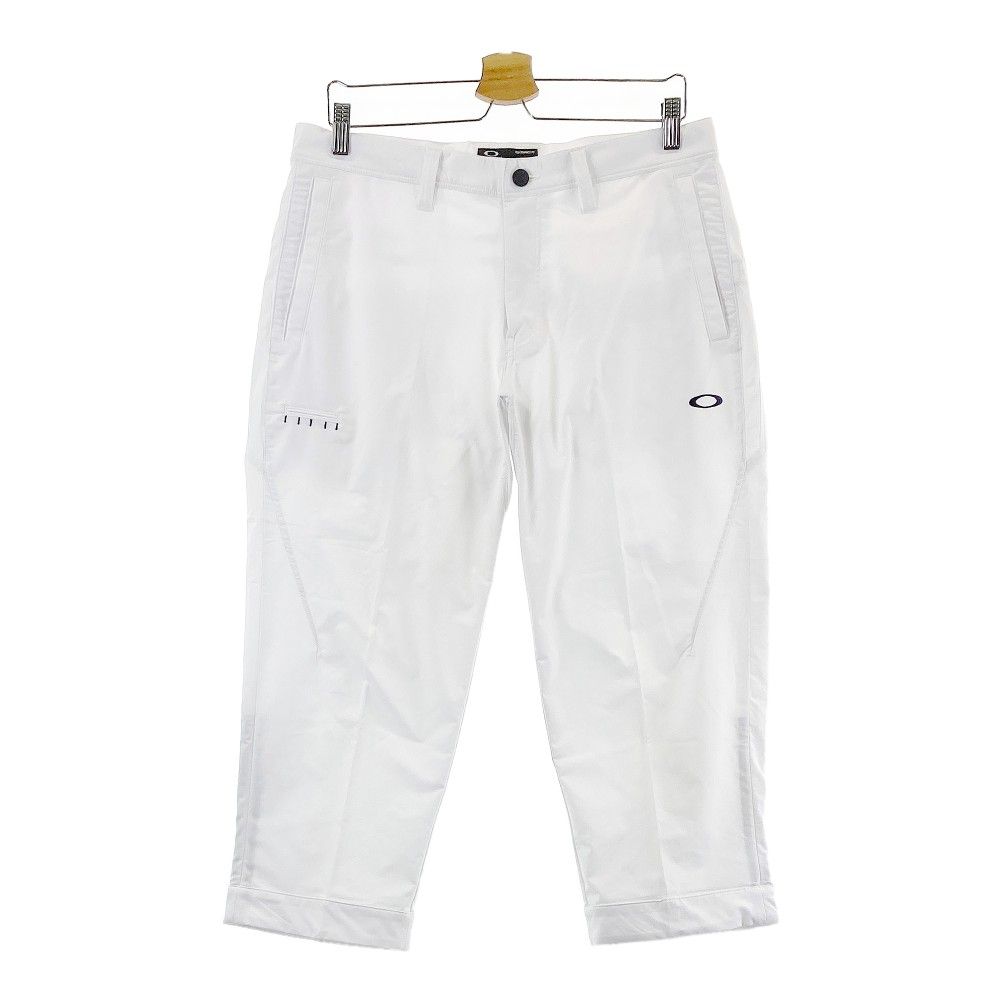 サイズ：34 OAKLEY オークリー FOA403510 2022年モデル クロップドパンツ  ホワイト系 [240101257898]# ゴルフウェア メンズ ストスト