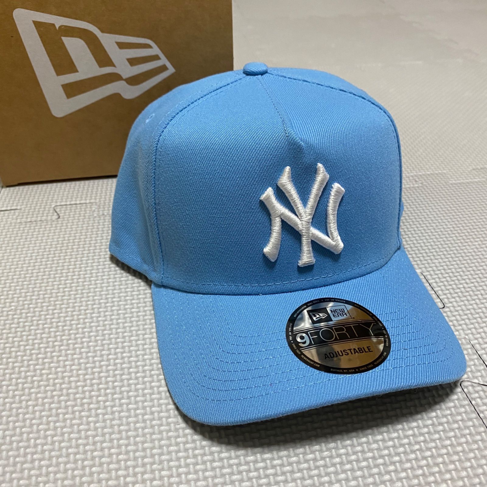 NEWERA》ニューエラニューヨークヤンキーススナップバックキャップスカイブルーホワイトロゴつば裏グレー