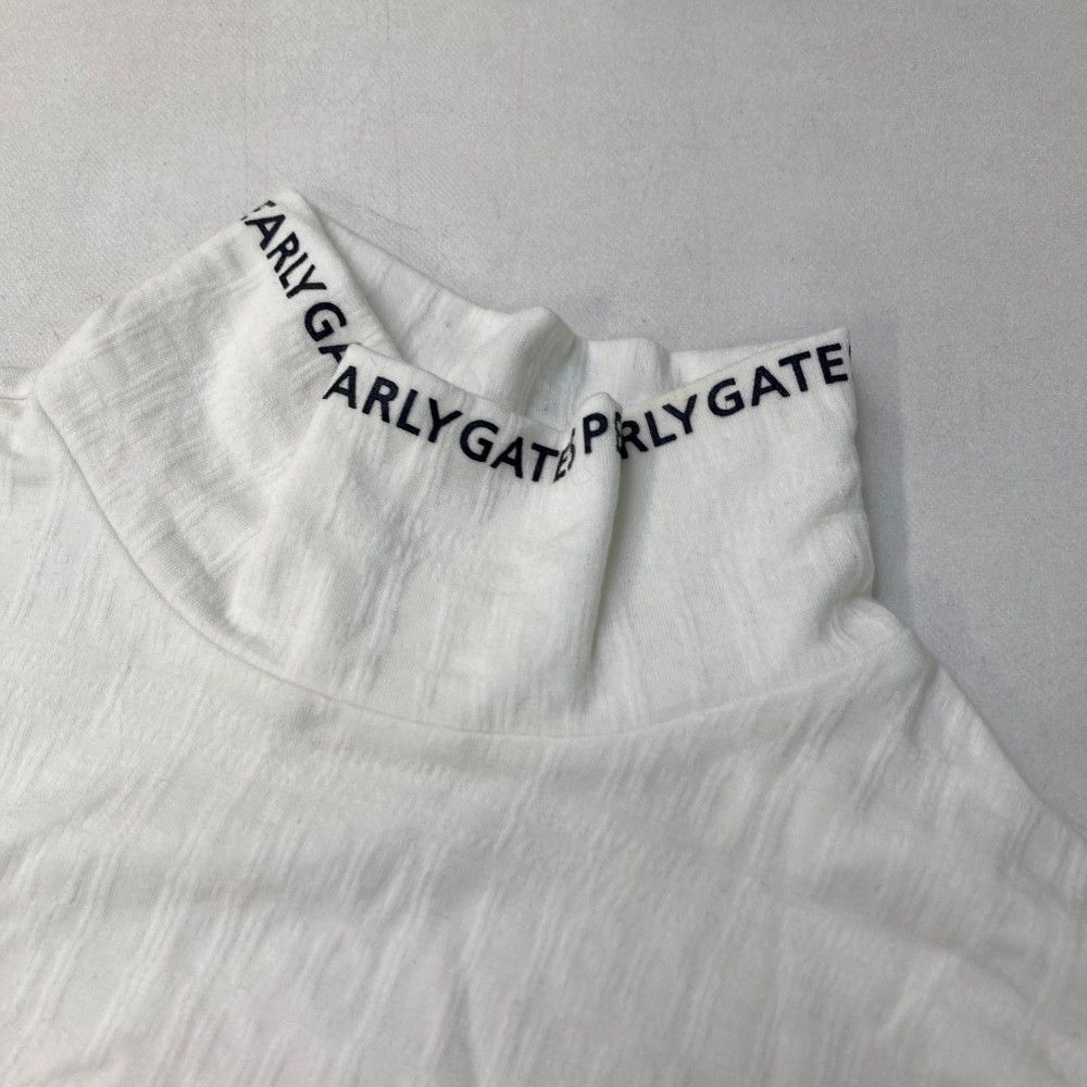 サイズ：2 PEARLY GATES パーリーゲイツ  ハイネック長袖Tシャツ  ブラック系 [240101434224] ゴルフウェア レディース ストスト サイズ：2 PEARLY GATES パーリーゲイツ ハイネック長袖Tシャツ