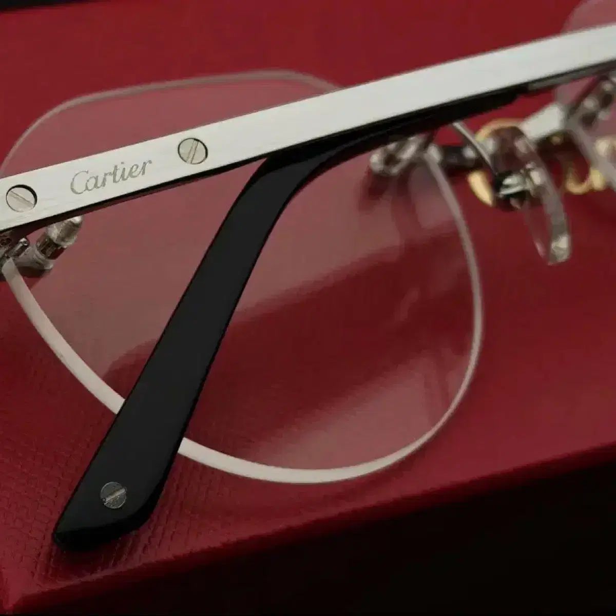 Cartier（カルティエ) ct0408o ラウンドフレーム チタン 縁なし