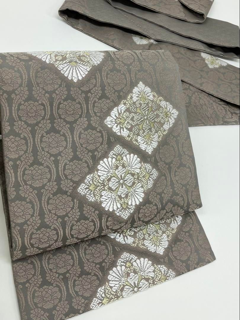 錦唐織 九寸名古屋帯 新品未使用品 菊 金糸 銀糸 正絹 - メルカリ