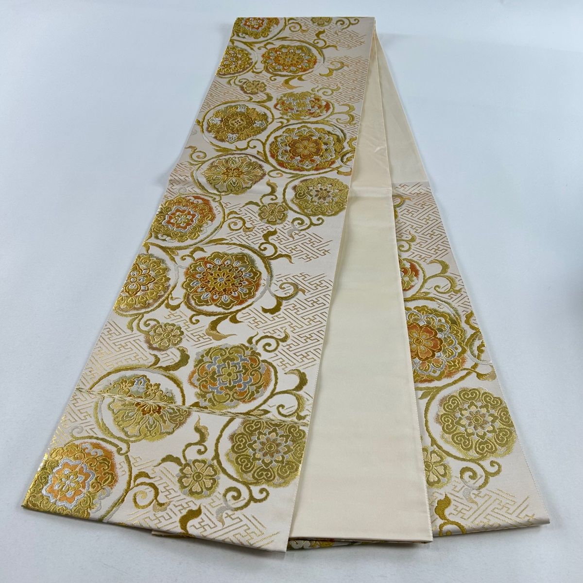 美品 袋帯 名品 花唐草 幾何学模様 金糸 茶緑色 六通 正絹 中古