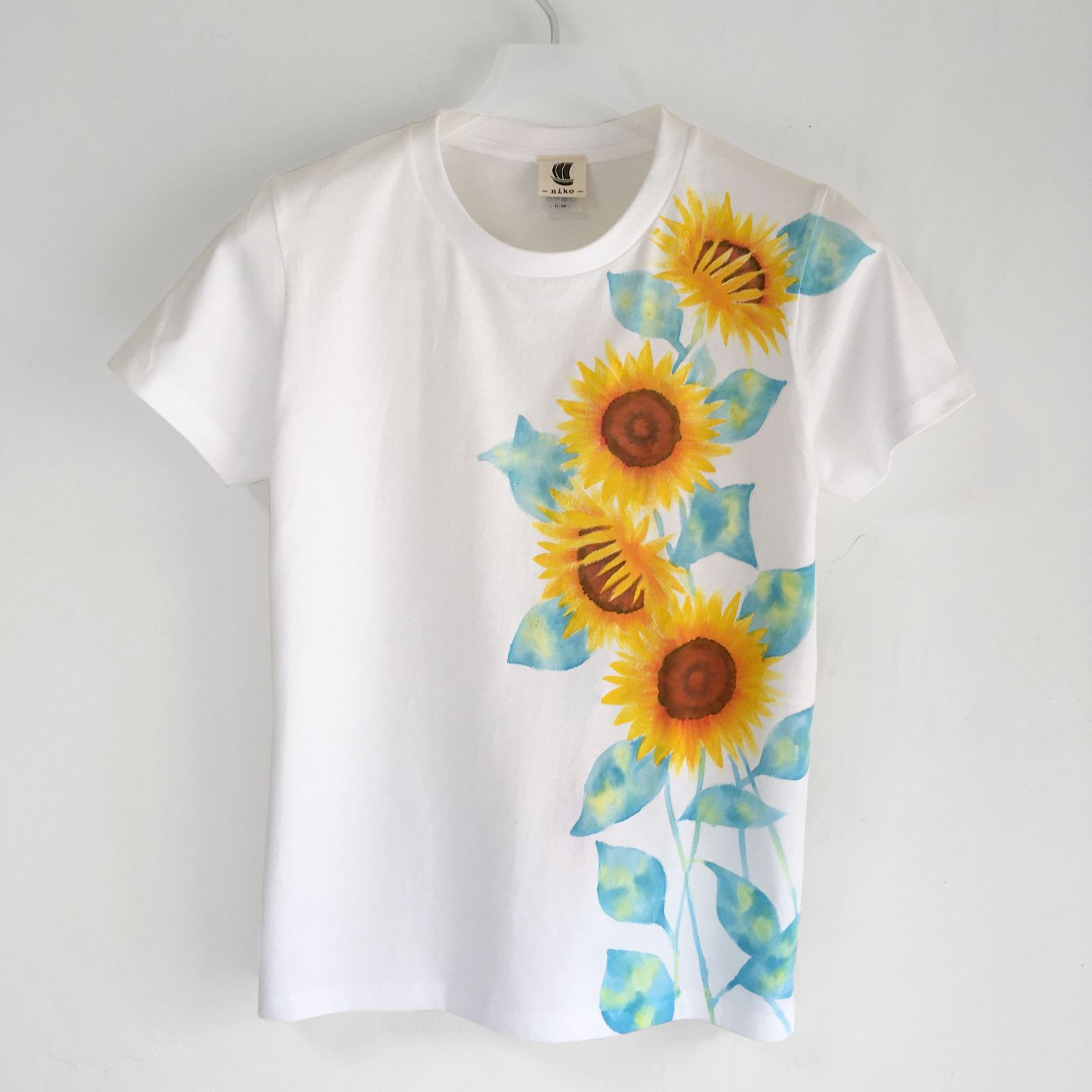 ひまわり柄Tシャツレディース 手描きで描いた向日葵の花柄Tシャツ - メルカリ